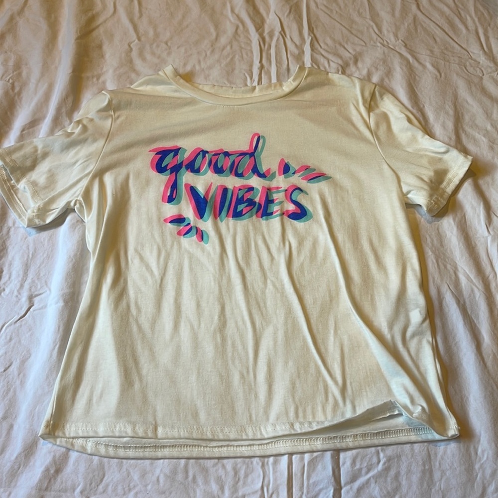 White “good vibes” tee